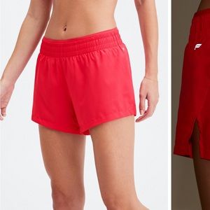 Fabletics Breathe Mid Rise Run Shorts in Lipstick Red/Reflective Silver